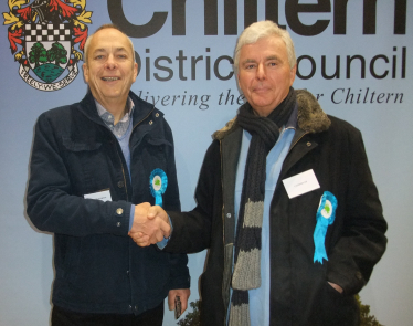 Winning candidate JonathanRush (rt) being congratulated by David Martin 